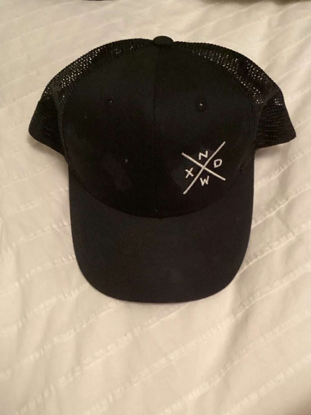 Black Mesh Trucker Cap with White Crossed Letter Accent